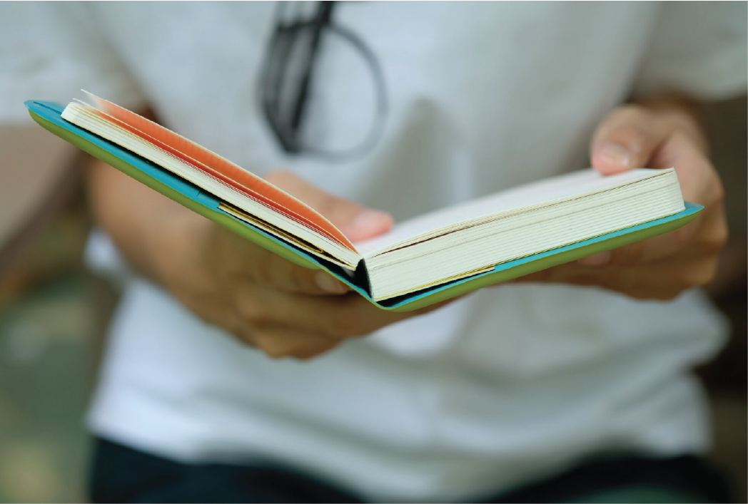 Doctor reading a patient guide